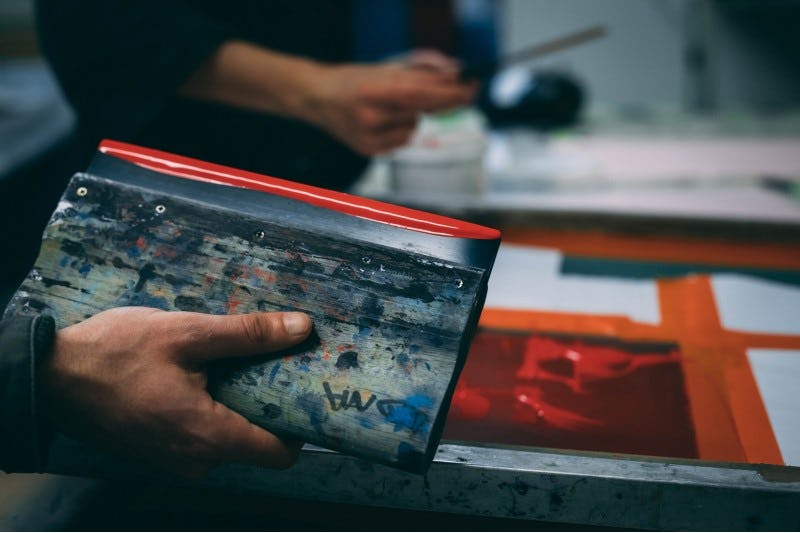 Personas con negocio propio de serigrafía