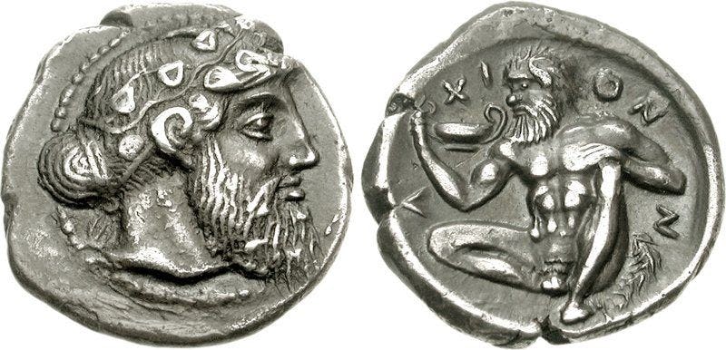 monedas historia logotipo